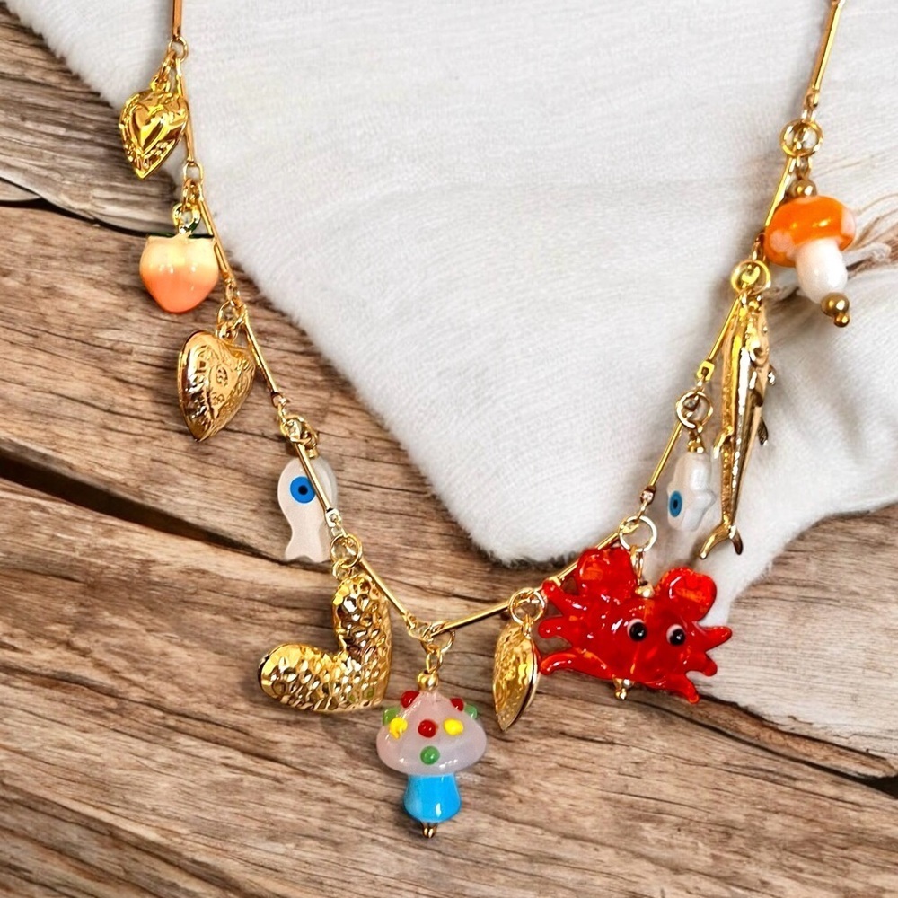 Adorable gold toned summer fun charm necklace. Crab boils here we come! - Picture 9 of 17